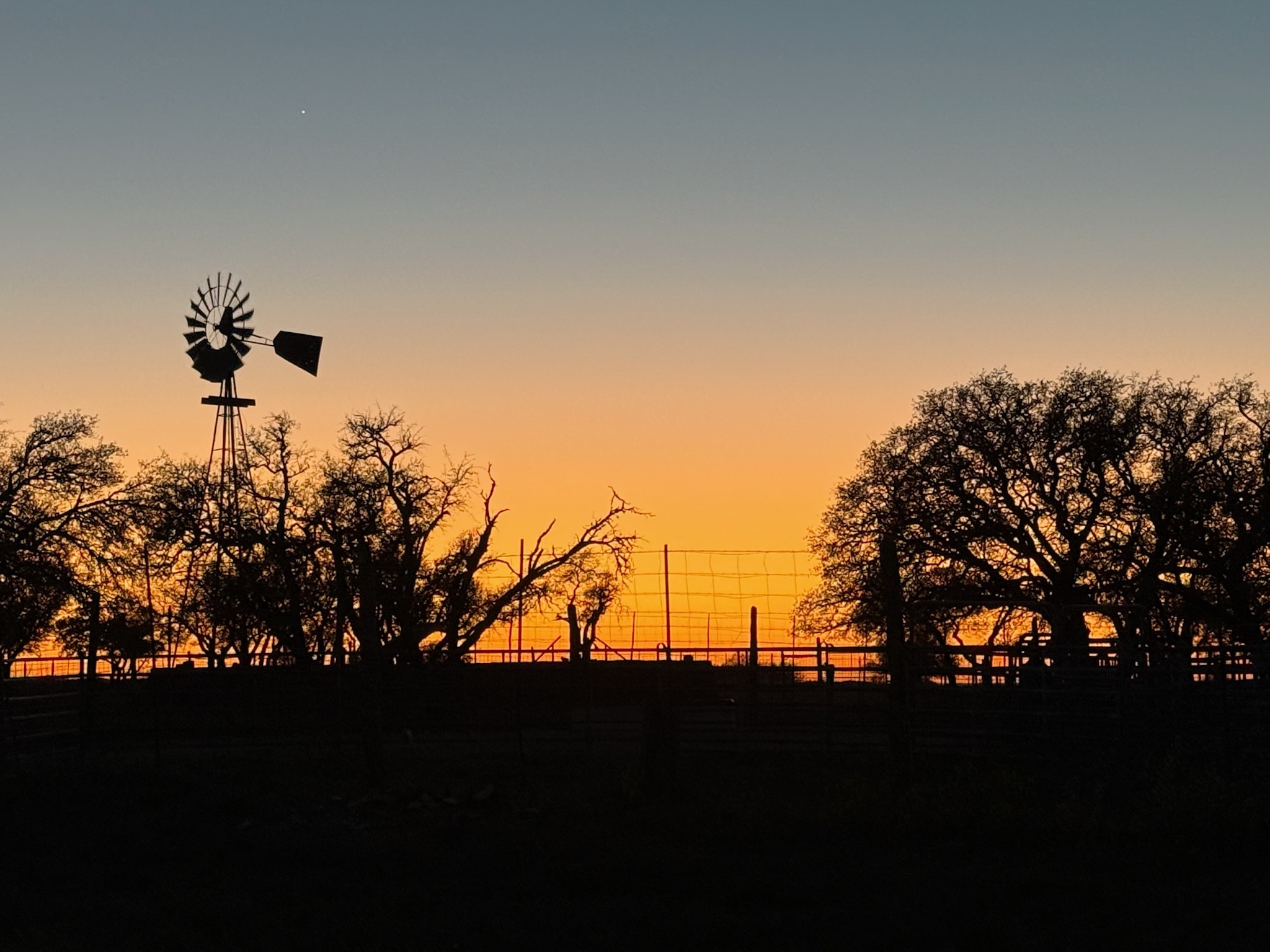 3-Wire Ranch windmill at sunset — Texas Hill Country